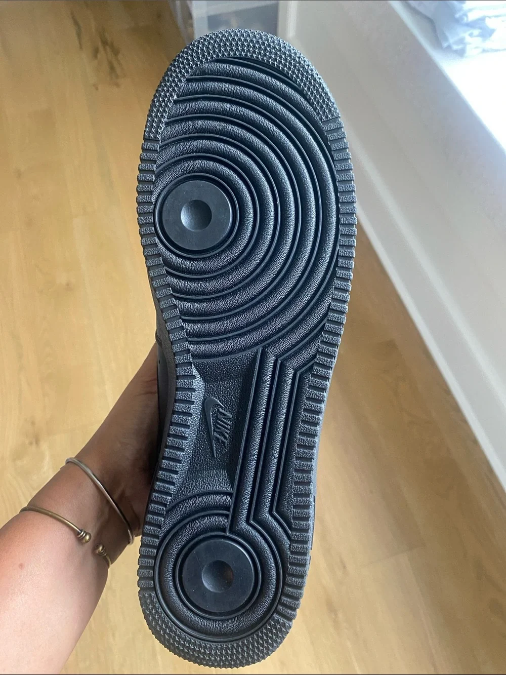 Nike Air Force’s Black Men’s Low-Top Leather Sneakers